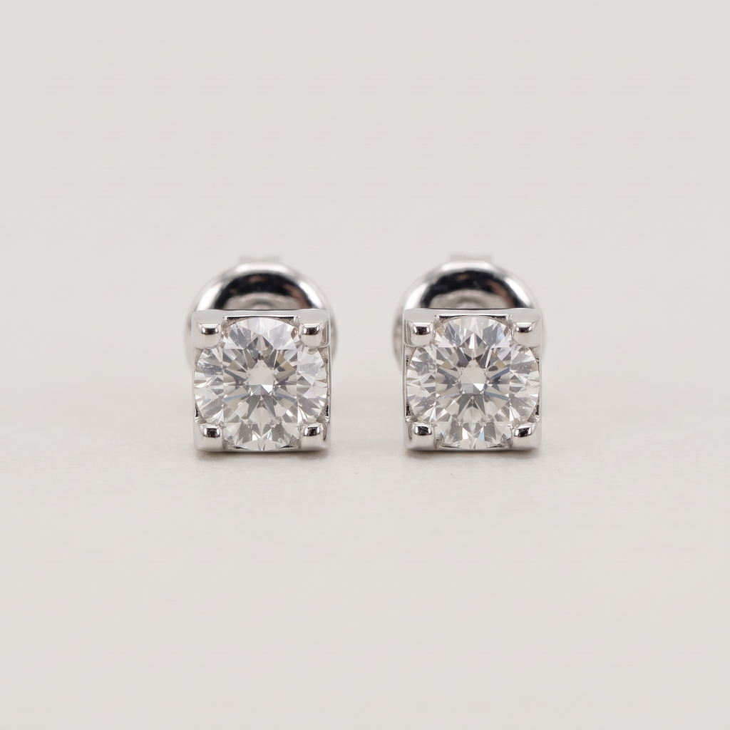 Orecchini punto luce 0.60 ct